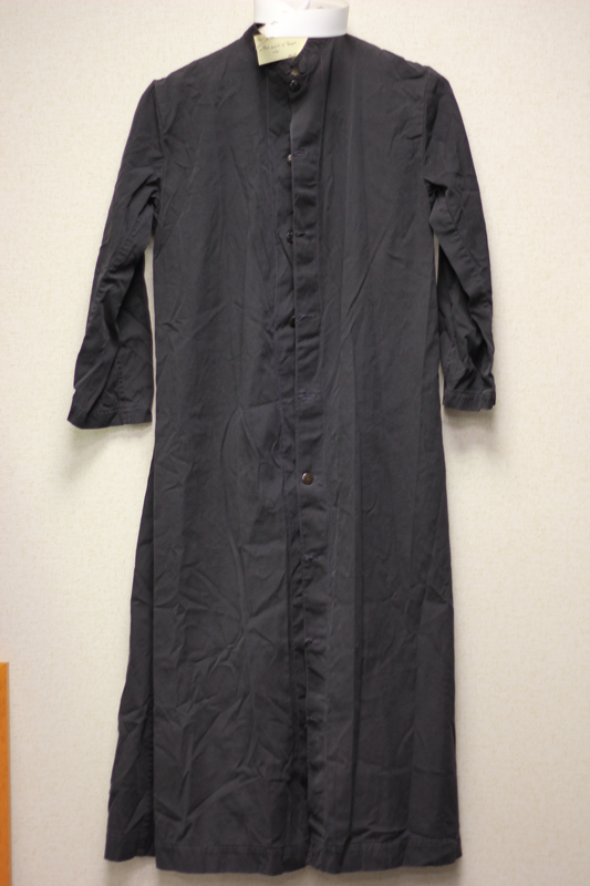 black cassock w/ Roman collar